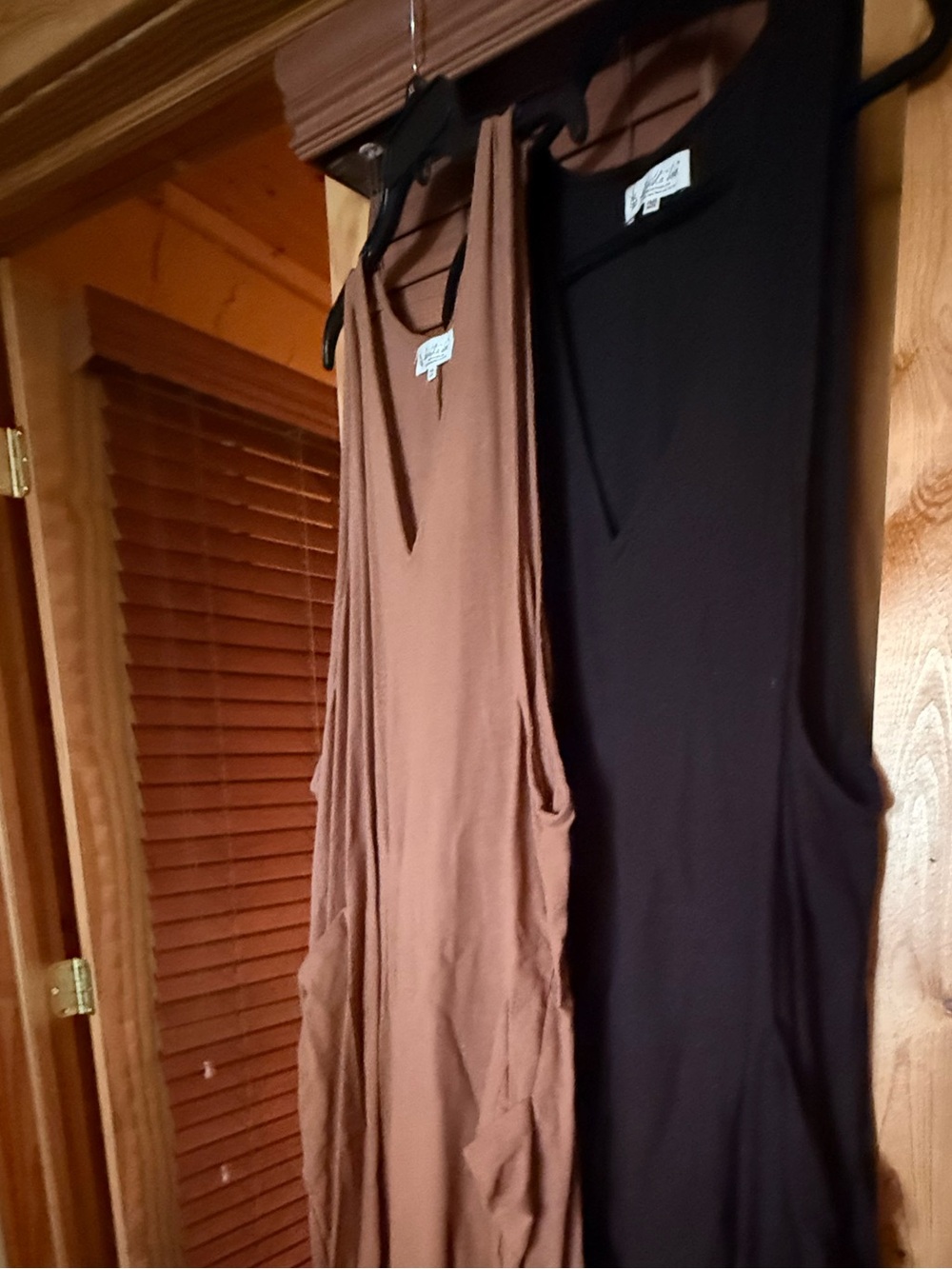 Two Kantha Bae Sleeveless Wide-Leg Jumpsuits in Brown and Black